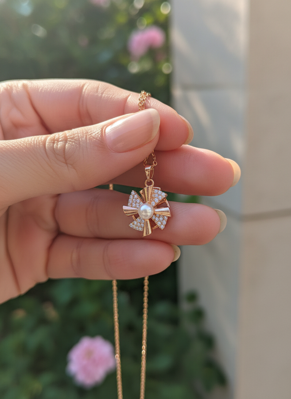 Elegant Rose Gold Pearl Spinner Pendant Necklace