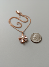 Elegant Rose Gold Pearl Spinner Pendant Necklace