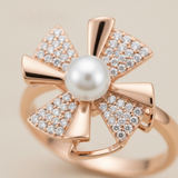 NXGOLD Rose Gold 360° Rotating Flower Ring with Pearl & CZ Stones