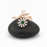 NXGOLD Luxury 360° Rotating Daisy Ring with Emerald Green Stone