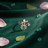 NXGOLD Luxury 360° Rotating Daisy Ring with Emerald Green Stone