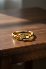 NXGOLD Elegant Gold Women’s Ring with Leaf & Loop Design