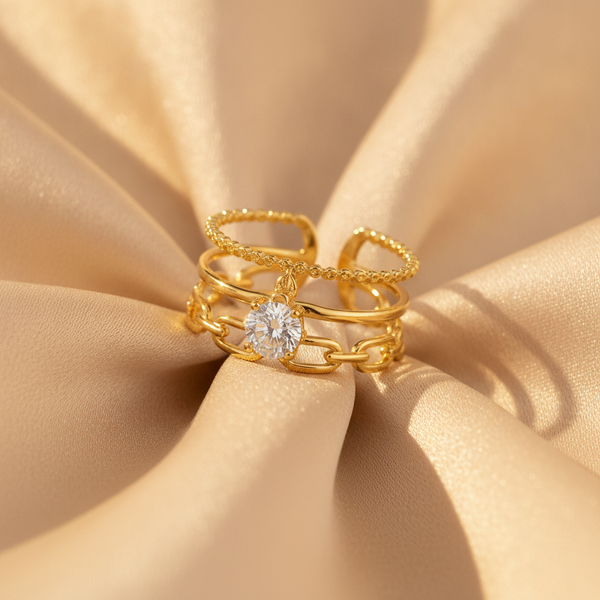Luxury Triple Band Gold Ring with Brilliant Solitaire Stone