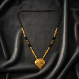 Royal Ethnic Black Bead Mangalsutra with Antique Oval Floral Pendant