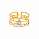 Luxury Triple Band Gold Ring with Brilliant Solitaire Stone
