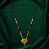 Royal Ethnic Black Bead Mangalsutra with Antique Oval Floral Pendant