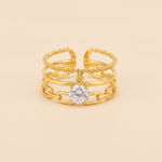 Luxury Triple Band Gold Ring with Brilliant Solitaire Stone