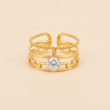 Luxury Triple Band Gold Ring with Brilliant Solitaire Stone