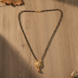 NXGOLD Antique Style Black Bead Mangalsutra with CZ & Ruby Pendant