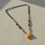 Royal Ethnic Black Bead Mangalsutra with Antique Oval Floral Pendant
