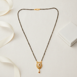 NXGOLD Antique Style Black Bead Mangalsutra with CZ & Ruby Pendant