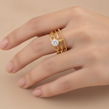 Luxury Triple Band Gold Ring with Brilliant Solitaire Stone